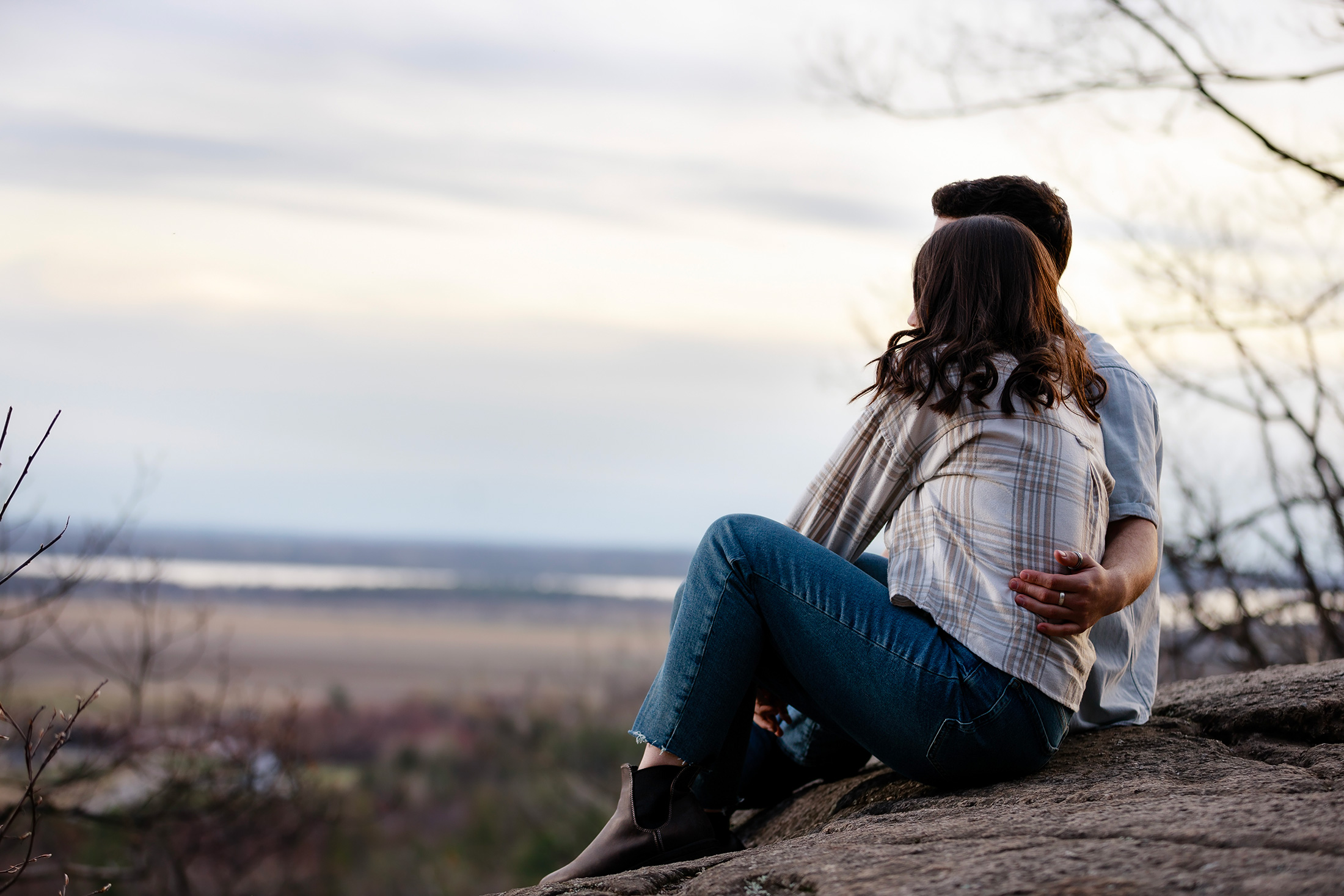Couple sharing a laugh at sunset